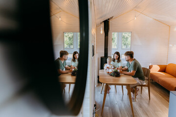 Cozy family breakfast with mirror reflection, showcasing togetherness and peaceful moments