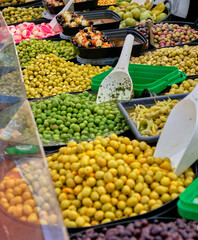 Various colored olives on a streetfood market