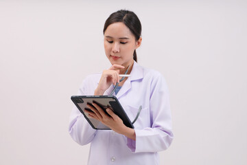 Smiling female doctor holding tablet on white background.