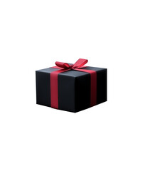 Obraz premium A black gift box with a vibrant red ribbon neatly tied into a bow, isolated against a black background, symbolizing sophistication and elegance in Christmas holiday packaging.
