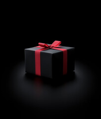 Obraz premium A neatly wrapped black Christmas gift box with a striking red ribbon tied in a perfect bow, standing out against a sleek black background, creating a luxurious festive aesthetic.