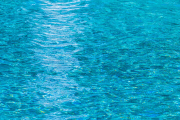 projection of blue water in a fountain