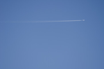 Airplane and its wake. Gran Canaria. Canary Islands. Spain.