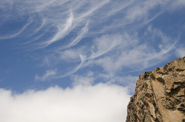 Rocky cliff and cloudscape. The Nublo Rural Park. Tejeda. Gran Canaria. Canary Islands. Spain.