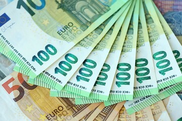 Many real european euro banknotes in big pile