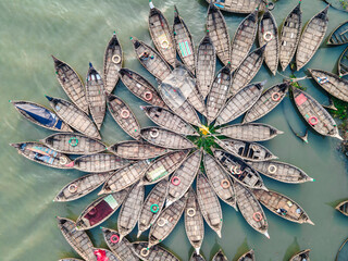 Aerial view of wooden passenger boats along the Buriganga River, Keraniganj, Dhaka, Bangladesh.