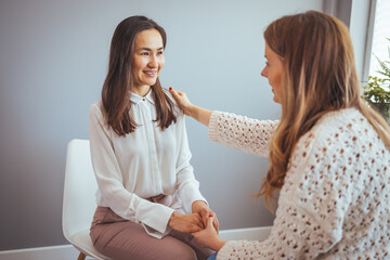 Supportive Conversation Between Two Women in a Calm Setting