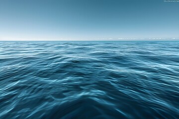Fototapeta premium A large body of water with a sky in the background