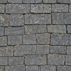 Fototapeta premium Detailed close-up of a gray stone wall with various textures and patterns.