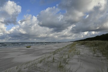 Deserted Beach with Dramatic Clouds