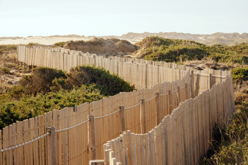 Coastal Pathway With Wooden Fencing and Sand Dunes