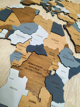 Africa on the political map. Wooden world map on the wall. Mali, Algeria, Libya, Egypt, Chad, Niger, Nigeria, Mali, Burkina Faso, Guinea, Cote D'Ivoire