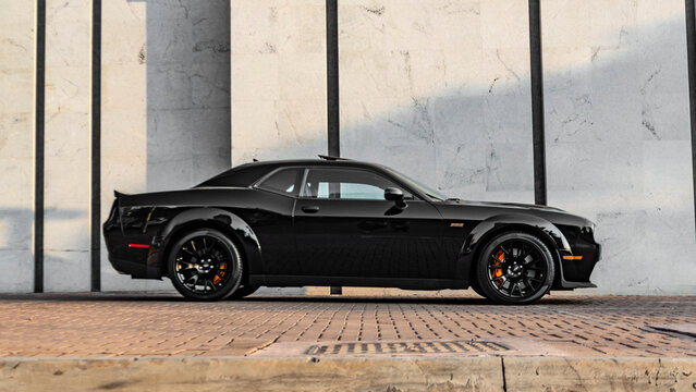 Black Dodge Challenger SRT side view on white background, High Resolution Automotive Photography, Sportscar