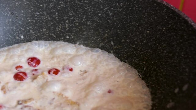 Spiral pasta pieces ready to be cooked close-up slow. Girandole corkscrew shaped pasta Italian food on table 