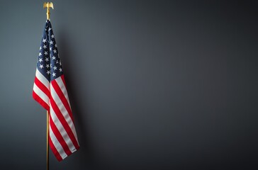 American flag displayed against a dark background in an indoor setting during daylight