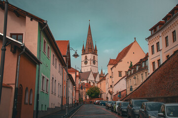 Narrow street that leads to the church in a medieval town