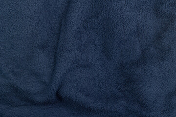 Naklejka premium Texture of blue soft terry surface with pile and folds