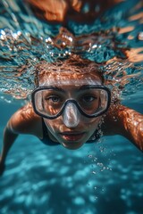 Fototapeta premium portrait of a woman underwater in the pool