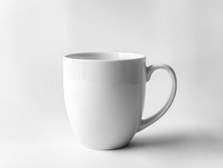 A simple white mug sits against a plain background, highlighting its shape and design.