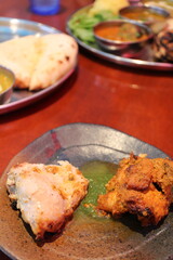 Indian cuisine: tandoori chicken (spiced and roasted chicken)
