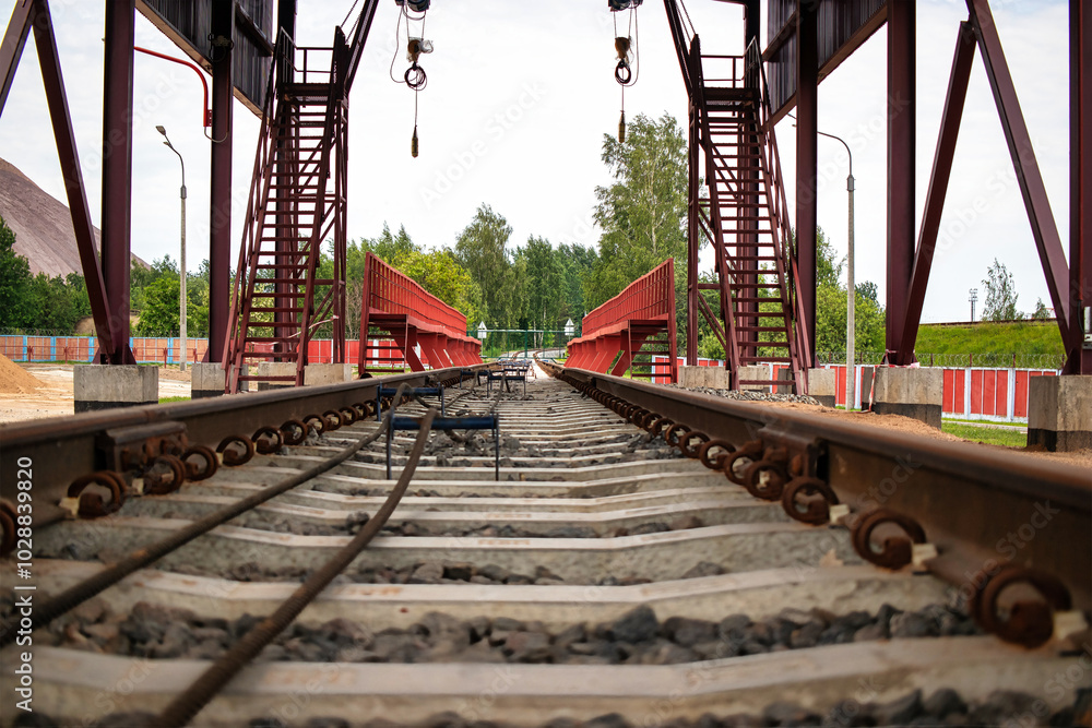 Poster Railway loading and unloading station with platform showcasing operational activity at the enterprise during the day