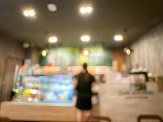 Blurred Coffee Shop Interior with Warm Lighting