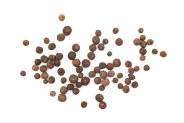 Black peppercorns isolated on white background. Top view