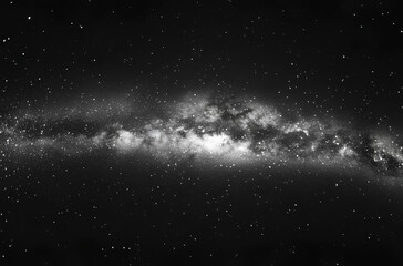 A black and white image of the Milky Way galaxy with a dense concentration of stars and nebulae.