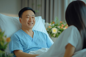 Male patient sitting in hospital room