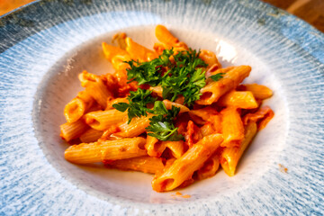 Pasta with ham, italian recipe penne con prosciutto cotto