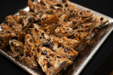 Dessert bars at an event in a plate, close up image of tasty treat at the coffee bar
