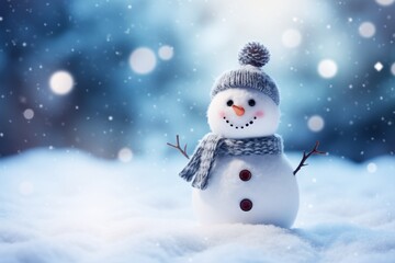 Snowman with Christmas hat and scarf on the snowy blue background. New Year's banner with space for text.