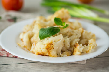Diet boiled cauliflower fried in oil with spices