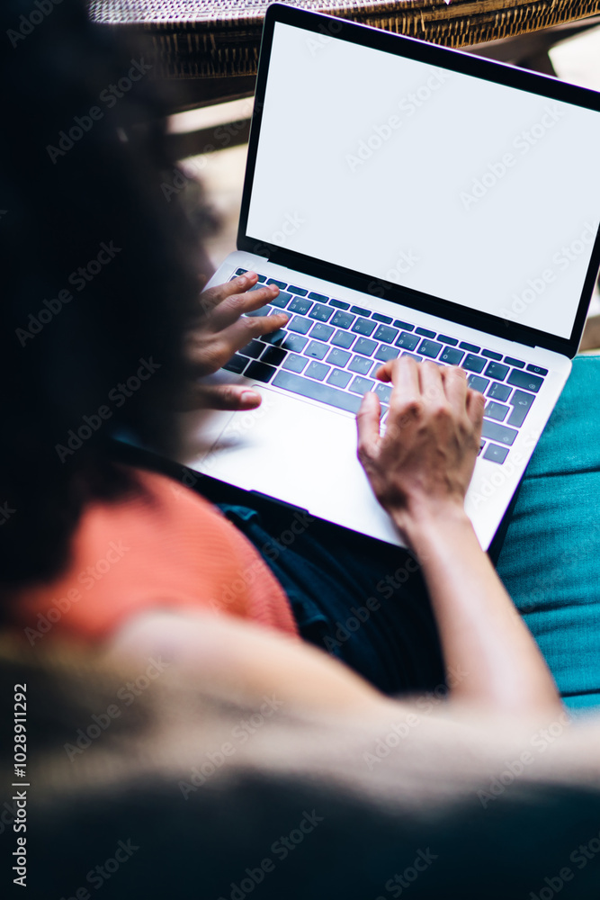 Poster cropped image of female software developer updating setting on antivirus application for laptop comp