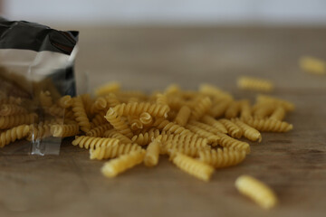 pasta on a wooden background. Close up. Selective focus.	