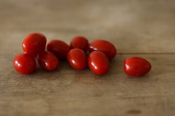 composition with tomatoes on a wooden table