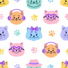 Seamless pattern with  cat faces  and paws  on white background.