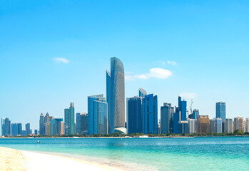 Obraz premium Panoramic view of main business part of Abu Dhabi with sea, skyscrapers in UAE