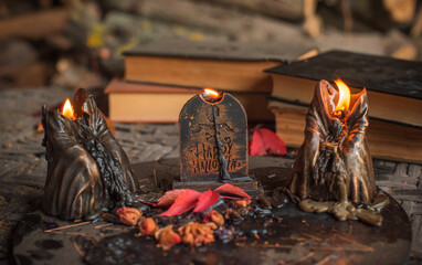Halloween altar details, spooky wax candles in mystery atmosphere