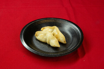 Freshly Made Gyozas with Savory Filling and Soy Sauce