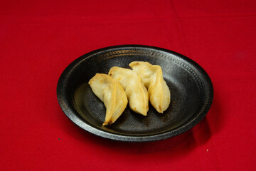 Freshly Made Gyozas with Savory Filling and Soy Sauce