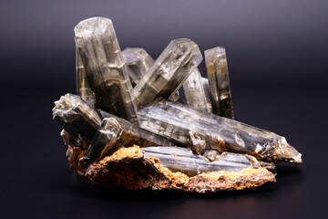 Black gypsum mineral specimen, collectible rock, dark crystal close-up photography.
