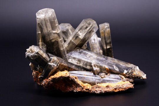 Black gypsum mineral specimen, collectible rock, dark crystal close-up photography.