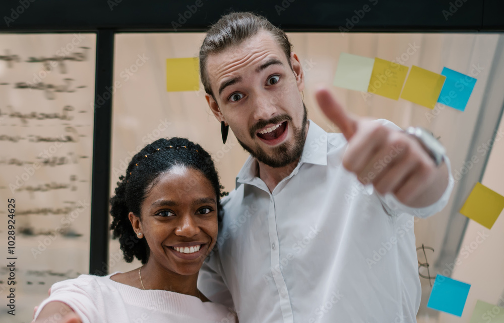 Wall mural half length portrait of cheerful multicultural male and female partners standing in office room and 