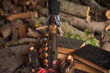 Magic doll for attracting love, rite with voodoo and fate creation, details on a table of witch,...