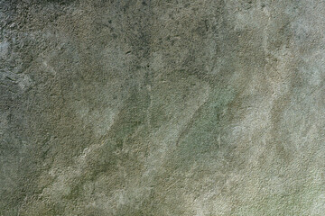 Grungy aged stone wall texture with textured surface and weathered pattern, perfect for vintage design or antique backdrop