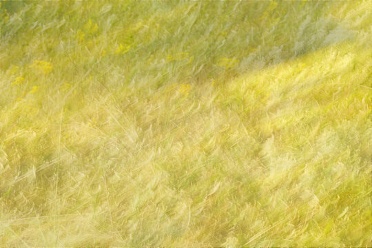 An abstract background of a sunny wildflower meadow with soft yellow and green tones using intentional camera movement. 