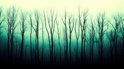 Obraz premium A hauntingly beautiful winter forest, with snow-covered branches and thick fog creating a mystical, ethereal scene.