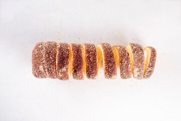 Traditional East Europe Christmas sugar glazed dessert chimney cake, trdlo or trdelnik, sweet...