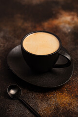 a black cup of aromatic coffee, americano